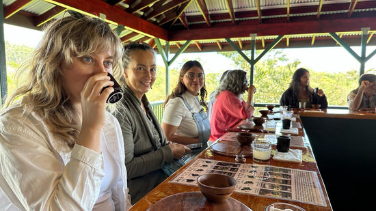 Image of guests sipping cacao tea